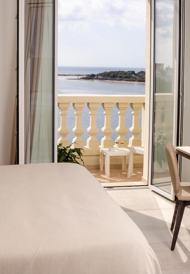 Hotel Falli Porto Cesareo Exteriör bild